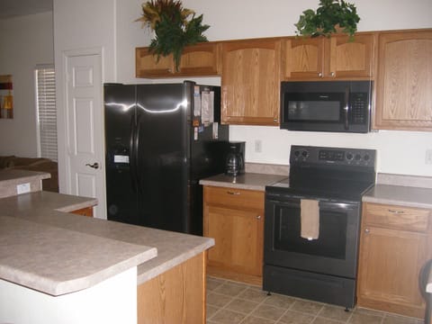 All new black stainless steel appliances