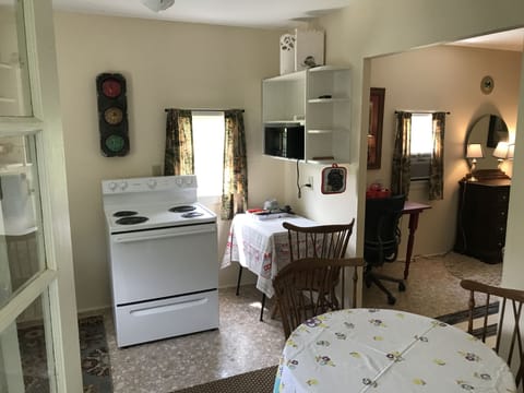 The garden cabin kitchen and bedroom