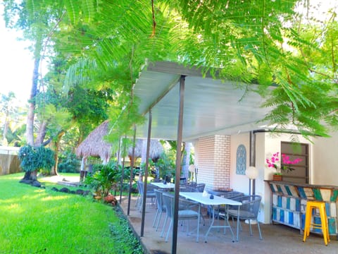 Covered patio has bathroom