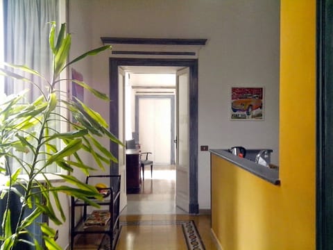 Kitchen trhough to Bedroom