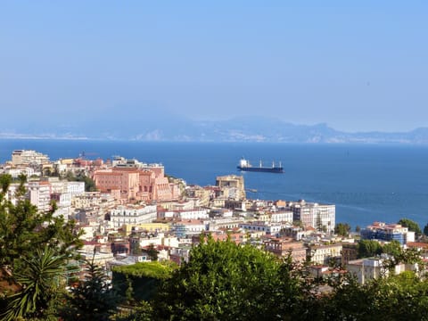 View of Historic Centre and the Bay of Naples. Sorrento on the far shore