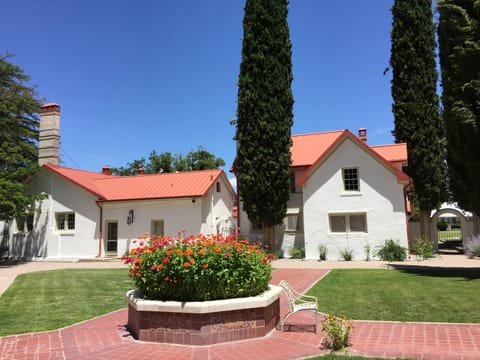Patio apartment is beyond and to the right, in the 2-story building.