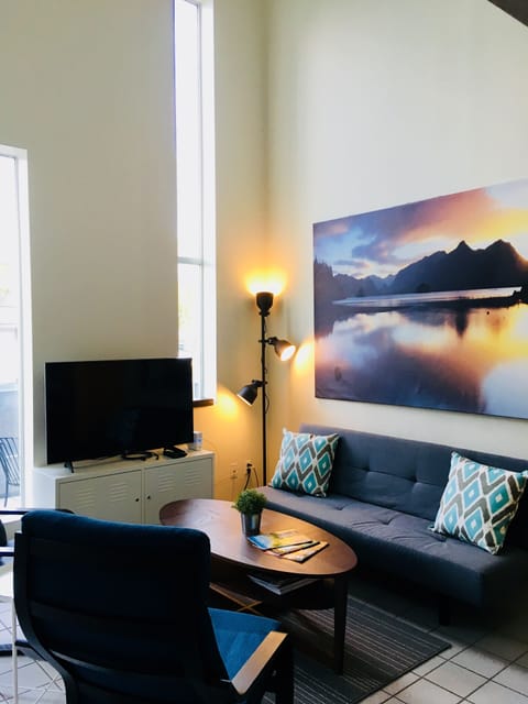 Modern spacious living to unwind in. Sleep futon folds down easily.