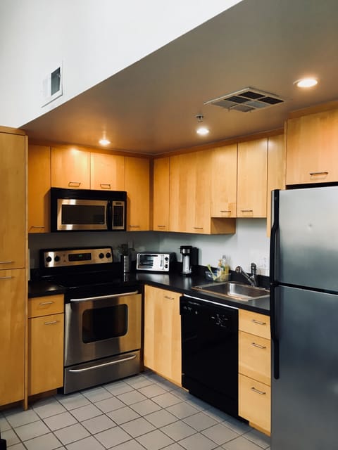 Fully stocked kitchen ready for you to make a meal or just coffee and tea.