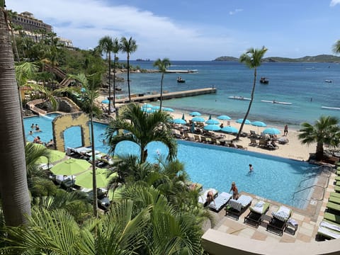 Awesome pool & beach. Waterslide & kiddie pool. Multiple decks for relaxing