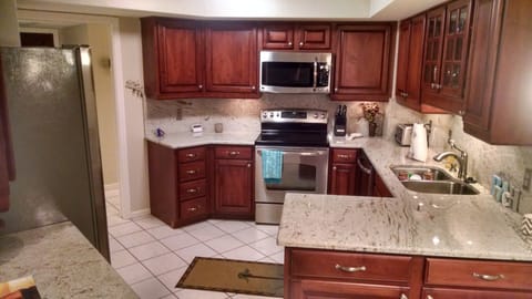Kitchen with stainless steel appliances and granite counter tops