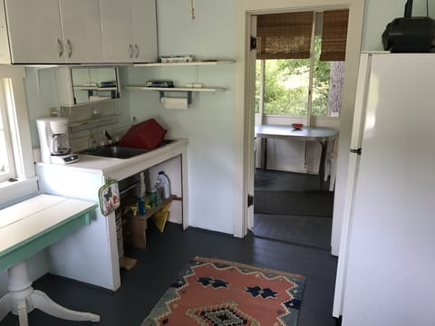 The river cabin kitchen looking onto the porch