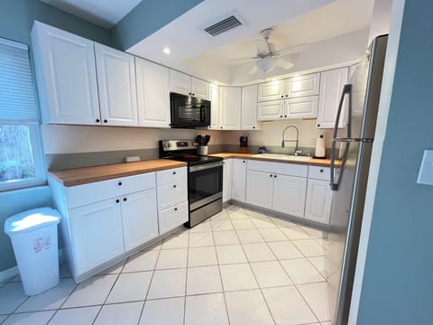 Open kitchen is fully equipped with everything you need.