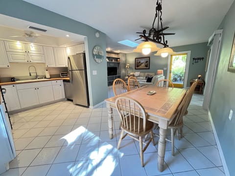 Open kitchen, dining, and living room.