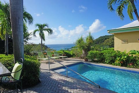 Your view to the south from Tennis Villa looks out over Chocolate Hole Harbor