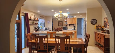 Looking into dining room and kitchen from living room.