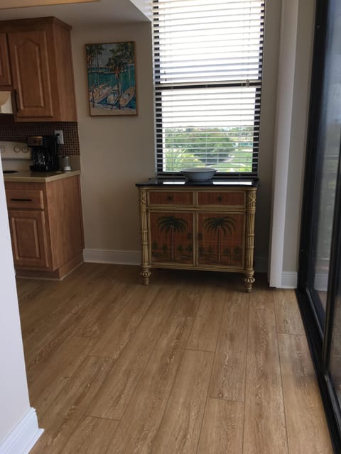 Hall to kitchen and sliders to balcony 