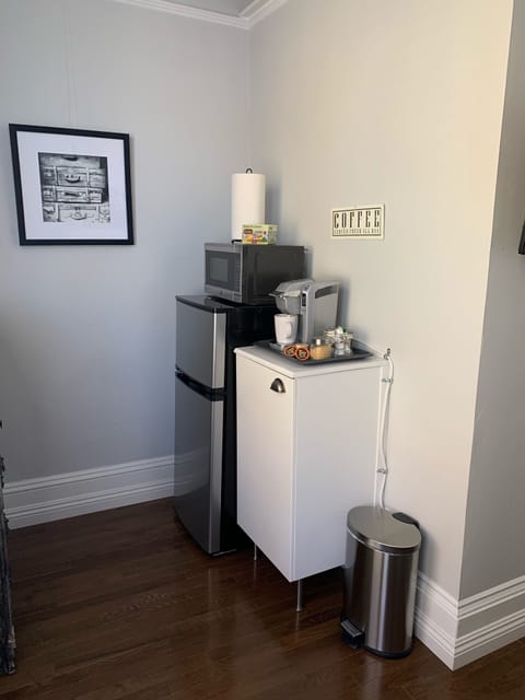 Refrigerator/Freezer, Microwave, Keurig, Canibet with dishes, glasses, utensils