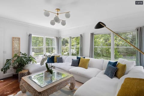 Sunroom with 360° views, deck access, and year-round stunning Otter Pond sunsets