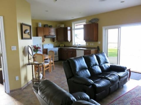 View of open floor plan, kitchen, view to oceanfront and great room