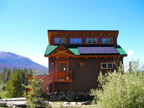 Front of house in summer.