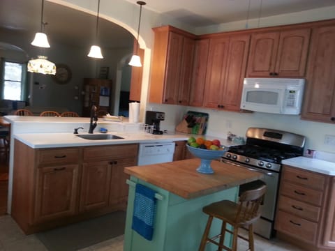 Bright kitchen, fully equipped/beach tags! Laundry/full bathroom behind kitchen.