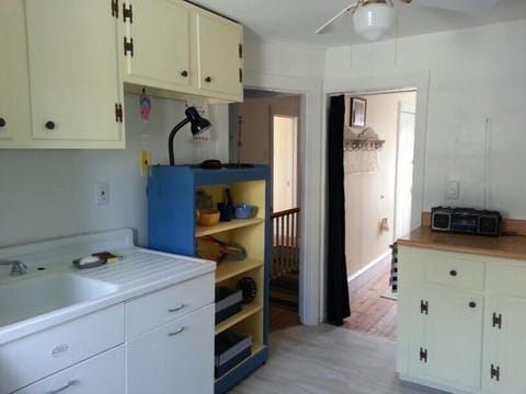 3rd fl. efficiency kitchen w/ microwave, toaster oven, coffee pot.