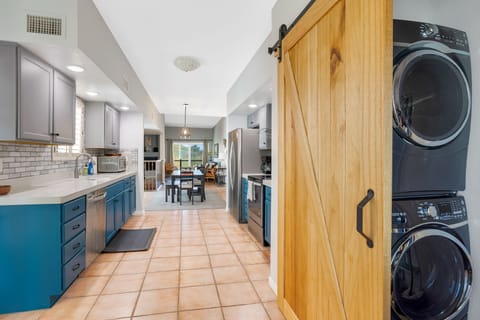Washer / Dryer off kitchen in the pantry.