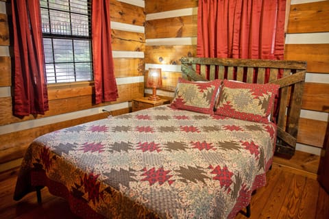 One of the two bedrooms, each with a queen bed - LINENS ARE PROVIDED!