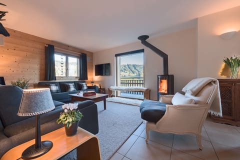 Main reception with wood burner and stunning piste views