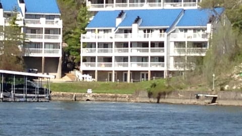 On the water directly! End building- very top floor middle unit - 40 foot deck!