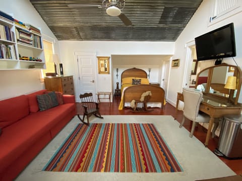 The apartment is one large room with sofa bed in living/dining area,