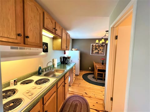 Kitchen with stove top, no oven