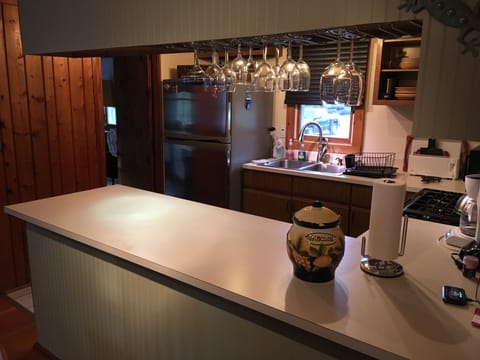 Another view of the kitchen from the dining area looking in.