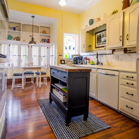 The kitchen that is equipped with everything you need, including two ovens.
