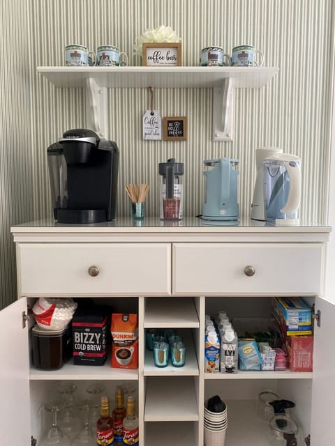 Your own coffee bar in the dining room helps you begin your mornings.