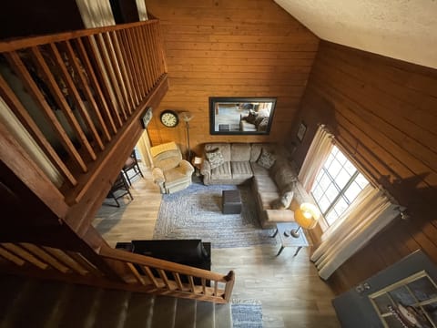 NEW FLOORING SEPT 2023~ living room view from upstairs bedroom~ no privacy walls
