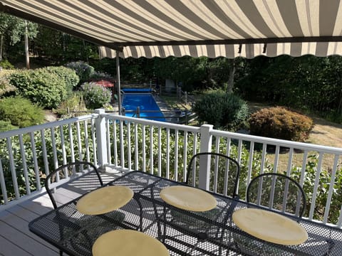 On deck, outdoor table for seating 6 to 10 people