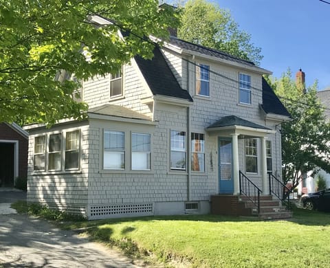 Newly painted gray shingled Cottage 