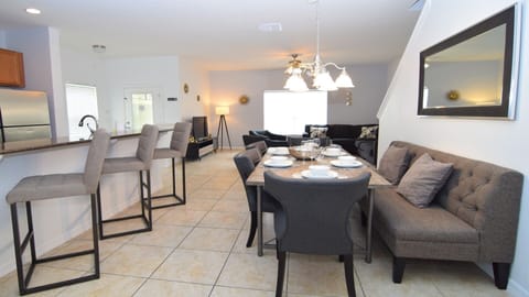 Open-plan living space with beautiful formal dining area