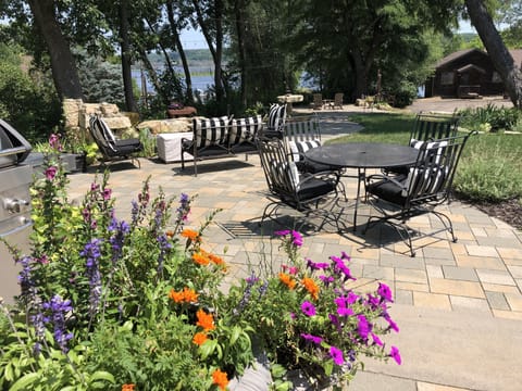 Relaxing outdoor spaces with garden and river views.
