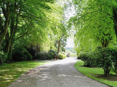 The cottage is hidden away at the foot of a long driveway with parking for two cars | Dunlappie Lodge, Edzell, near Brechin