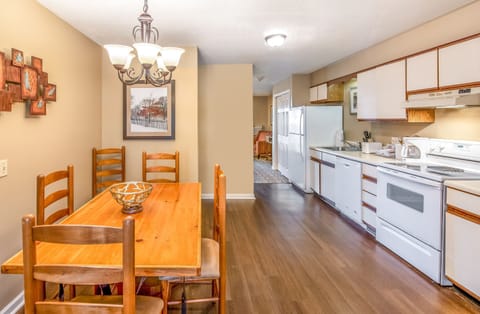 Loads of room at the dining table and the open-concept is always nice for the cook.