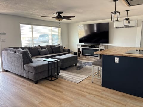 Relax in style after a day of adventuring! Big sectional & large screen Smart TV