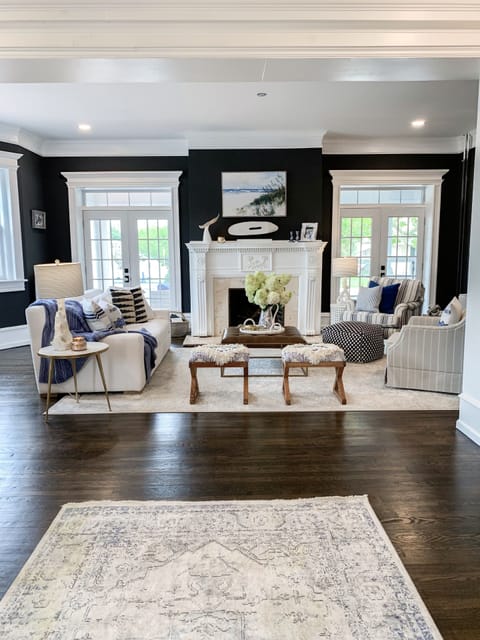 Family room view from the foyer. Double French doors lead out to the porch. 