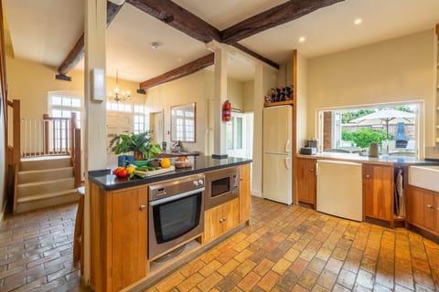 Ground floor: Kitchen with stairs to first floor
