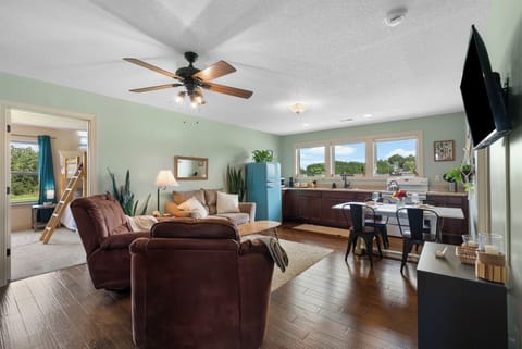 Bright open living, dining, and kitchen space for relaxing together.