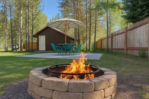 Roast some marshmallows on the fire pit in the private backyard