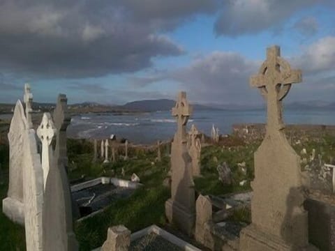 Moody sky over the 12th Century Abbey in Ballinskelligs..