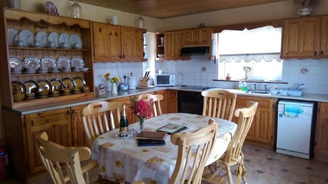 Traditional style solid wood kitchen, fully equipped with modern conveniences