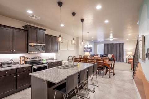 Kitchen Island - The Kitchen Island comfortably seats 4 adults and creates a great space for serving and preparing meals.