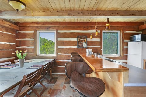 Large windows flood the main living areas with natural light