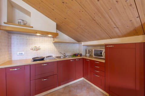 Kitchen with fridge and dishwasher