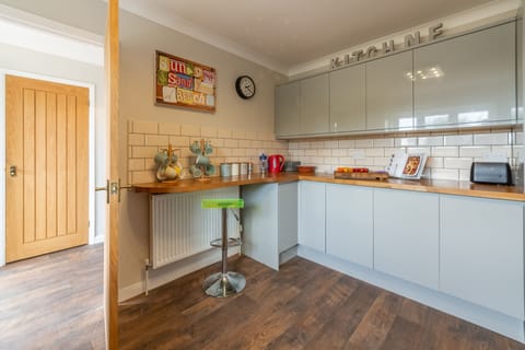 Ground floor: Kitchen with engineered wooden flooring