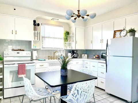 TheBrickHouse Kitchen - includes cooking utensils, pots, pans, etc. Oh did I mention there is a Mini Essenza Nespresso maker with complimentary pods provided? And a coffee bar?! 